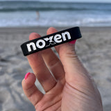 NOXEN Charity Wristbands – Ride Every Wave for Change